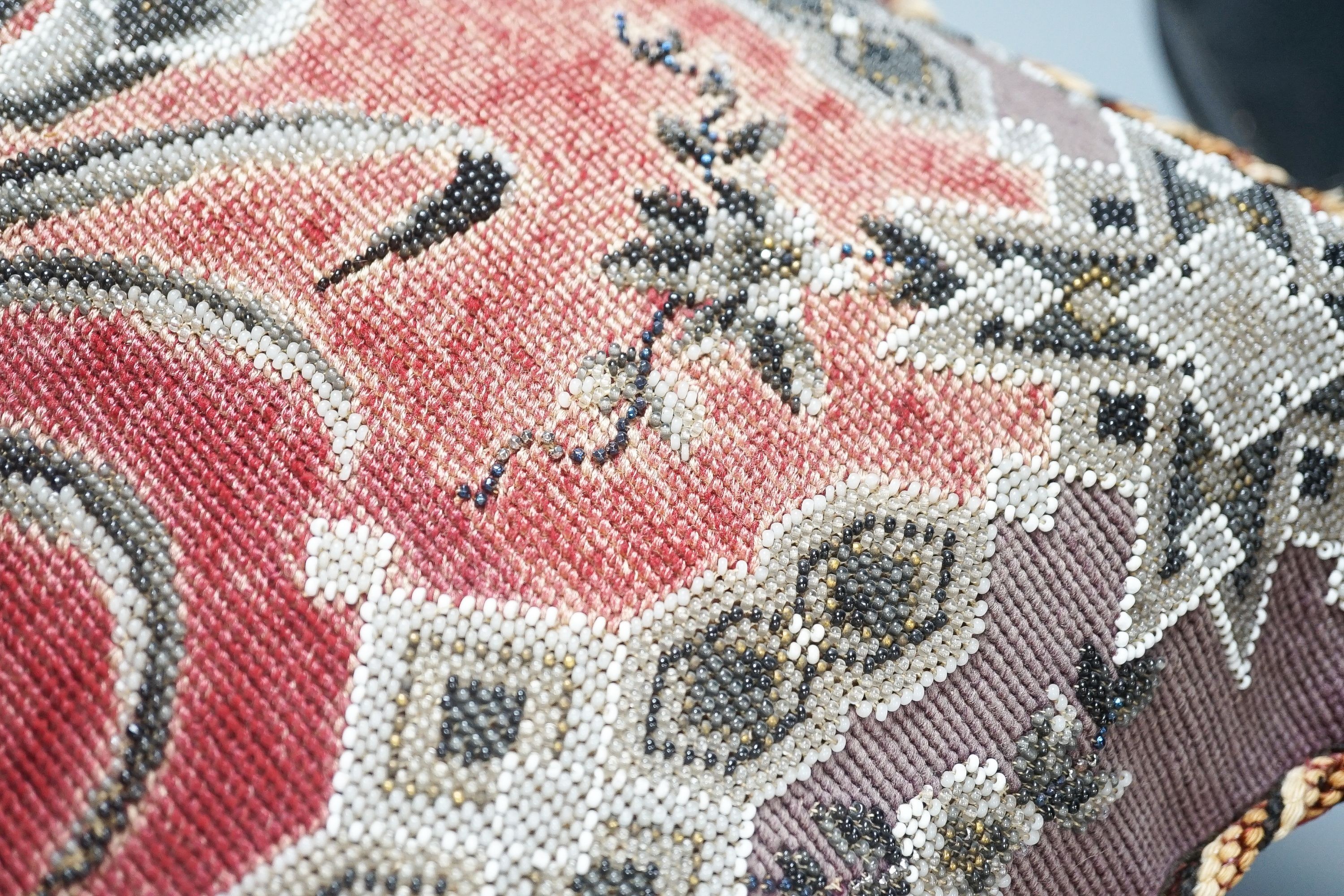 A 19th century wool worked chair seat and back and a 19th century Berlin bead worked cushion